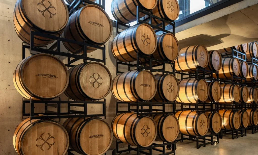 The Craft Behind the Glow: Unsworth Vineyards’ Barrel Wall
